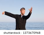 Man practicing Tai Chi – Posture Single Whip