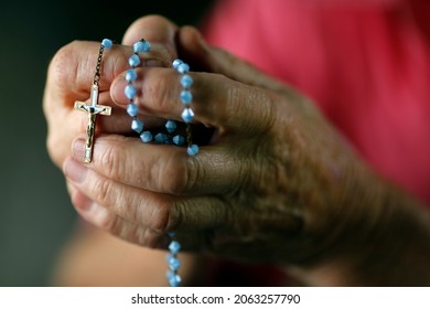 Man Prayer The Rosary. Close Uo On Hands.  France. 