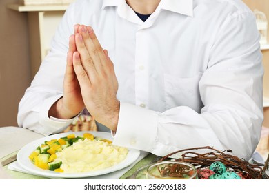 Man Praying Before Eating