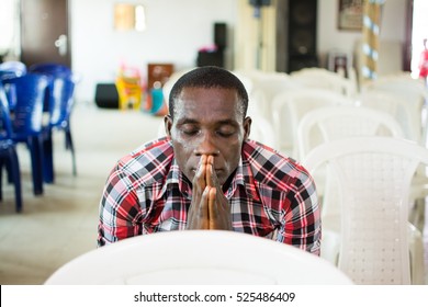 Man praying in church