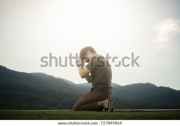 Man Praying God On Mountain Stock Photo (Edit Now) 727849864