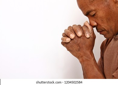 man praying to god with white background stock photo