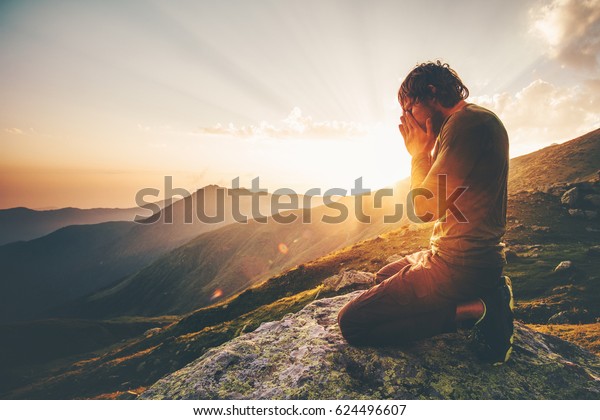 Man Praying Sunset Mountains Travel Lifestyle Stock Photo Edit Now