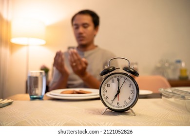 Man Praying Thanking God For The Food During Break Fasting