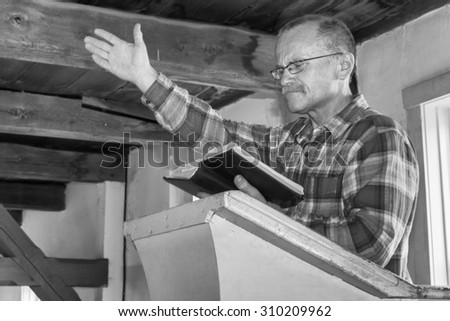 man preaching from the pulpit