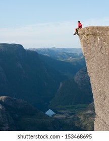 Man Preikestolen Or Pulpit Rock (Norway)