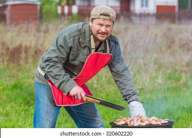 Man preparing barbecue