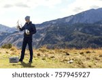 Man preparing drone for flight