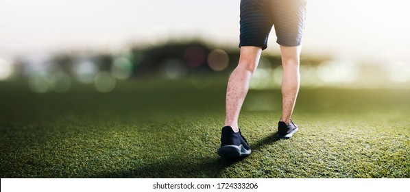 Man preparing to run in the park