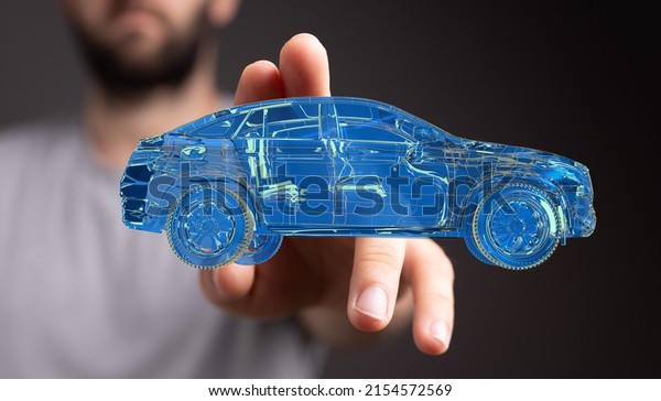 A man presenting a 3D rendering of a holographic\
smart car