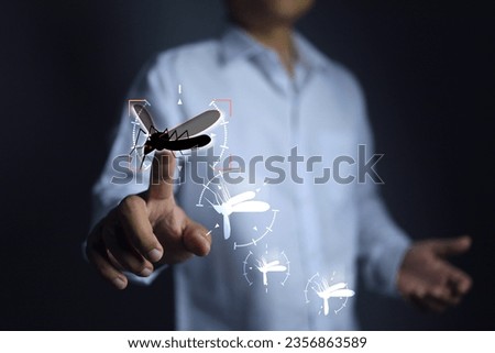 Man press on mosquito to kill for prevent mosquito bites and  dengue fever or malaria, which are carried by mosquitoes, more prevalent in the rainy season and in homes with forests.