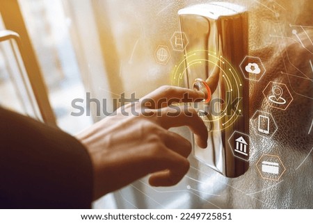 Man pressing elevator pitch button on virtual screen. Business, technology, internet and networking concept