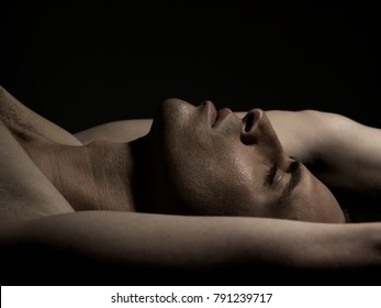 Man Profile With Arms Up And Closed Eyes