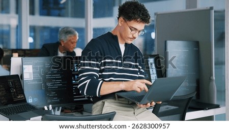 Man, programmer and office with laptop for coding, software development or app design. Male person, coder or developer with computer or technology for cybersecurity, web or IT services at workplace