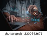Man programmer using laptop analyzing marketing and development information and Data Management System virtual interface screen.Business Intelligence data analysis, management concept.