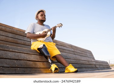 man with prosthetic leg playing musical instrument
 - Powered by Shutterstock