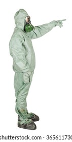 Man With Protective Mask And Protective Clothes Directional Pointing At Distance Looking Away. Full Body Length Portrait Isolated Over White Studio Background.