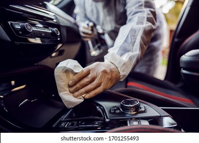 Man In Protective Suit With Mask Disinfecting Inside Car, Wipe Clean Surfaces That Are Frequently Touched, Prevent Infection Of Covid-19 Virus Coronavirus,contamination Of Germs Or Bacteria.