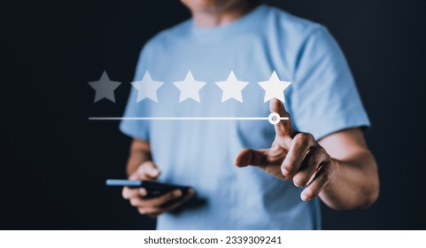 Man proudly points to a 5-star rating, given for an exceptional service, happiness and contentment are evident as he shares customer satisfaction service, feedback for the outstanding experience - Shutterstock ID 2339309241