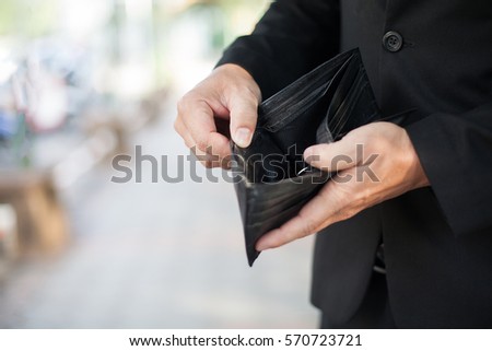 Man pulling out empty pockets [[stock_photo]] © 