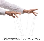 Man pulling strings of puppet on white background, closeup