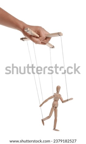 Man pulling strings of puppet on white background, closeup