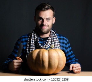 man with pumpkin