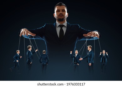 A man, a puppeteer, controls the crowd with threads. The concept of world conspiracy, world government, manipulation, world control