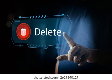 Man pushing the delete button on virtual screen. The concept of deletion or erase contacts, Deleting files from the system. Spam mail, electronic messages or personal data in computer systems. 