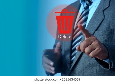 Man pushing the delete button on virtual screen. The concept of deletion or erase contacts, files, informations.