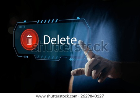 Man pushing the delete button on virtual screen. The concept of deletion or erase contacts, Deleting files from the system. Spam mail, electronic messages or personal data in computer systems. 