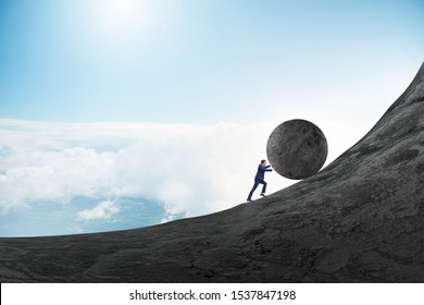 Man pushing large stone to the top