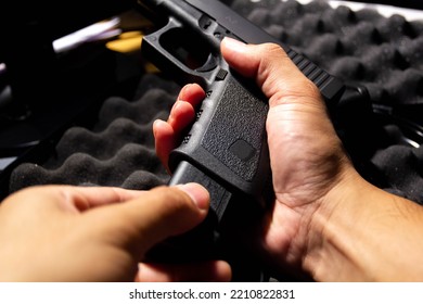 Man Put Pistol Holster To Glock Pistol