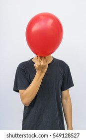 Man Put The Red Balloon In Front Of His Face Like Mask