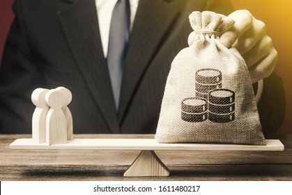 Man puts money bag and people on scales. Taxpayers concept. Decent salary pay for staff specialists. Business, crowdfunding startup. Investments in deposits. Social project financing. Labor migrants. - Shutterstock ID 1611480217