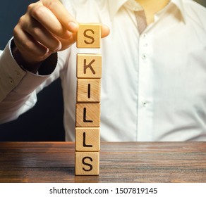 A man puts wooden blocks with the word Skills. Knowledge and skill. Self improvement. Education concept. Training. Leadership skills. Human abilities - Shutterstock ID 1507819145