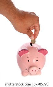 Man Putting Pound Coin In Piggy Bank Studio Cutout