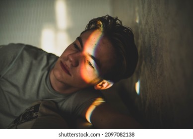 Man With Rainbow On Eyes Shadow And Smiley Nailpaint. LGBT Concept. Teenagers Problems, Sad Boy, Skin Problem.