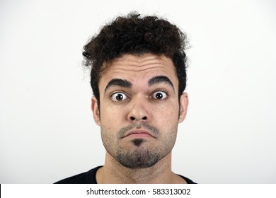 Man With Raised Eyebrows And Eyes Wide Open