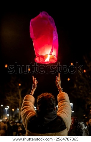 Similar – Image, Stock Photo Illuminated sky lantern floating in the night sky
