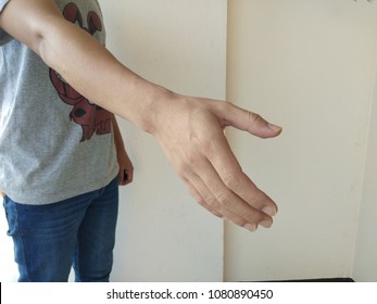 A man reaching his hand for shaking hands, selected focus.  - Shutterstock ID 1080890450