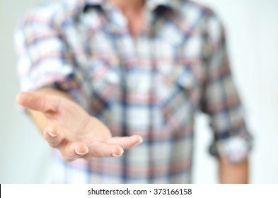 Man Reaching Out A Hand