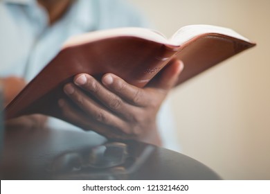 Man Reading The Bible