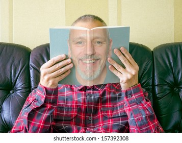 A Man Reading A Book About Himself, With His Face Seen On The Cover.