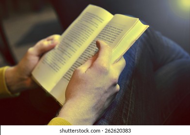 Man reading the book - sepia effect - Shutterstock ID 262620383