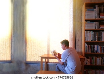 Man Reading Book .slow Life Concept