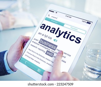 Man Reading the Definition of Analytics