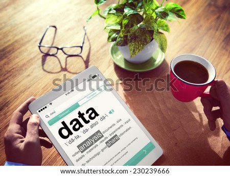 Man Reading the Definition of Data