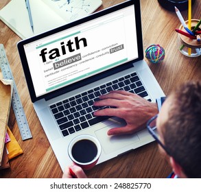 Man Reading The Definition Of Faith