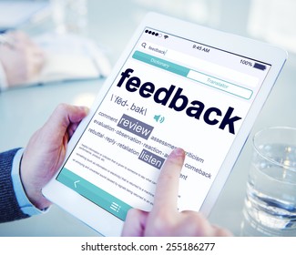 Man Reading the Definition of Feedback